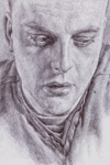 Ballpoint pen close up of a young man's face.